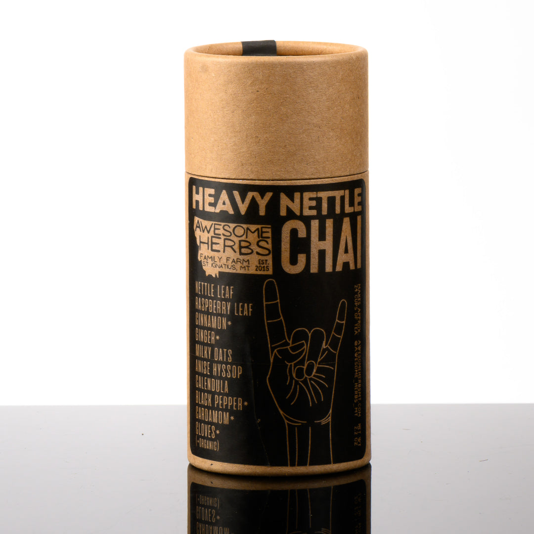 Awesome Herbs's Montana-grown loose leaf Heavy Nettle Chai herbal tea (tisane) in a brown Kraft tube--the perfect gift for a tea lover. 