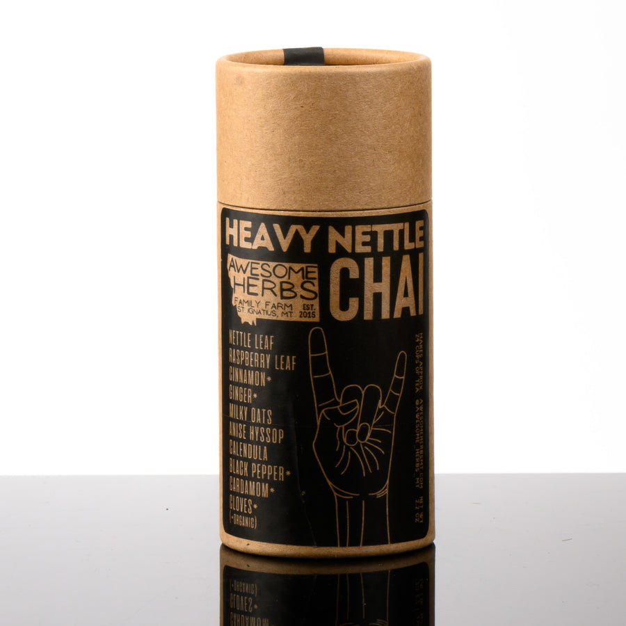 Awesome Herbs's Montana-grown loose leaf Heavy Nettle Chai herbal tea (tisane) in a brown Kraft tube--the perfect gift for a tea lover. 