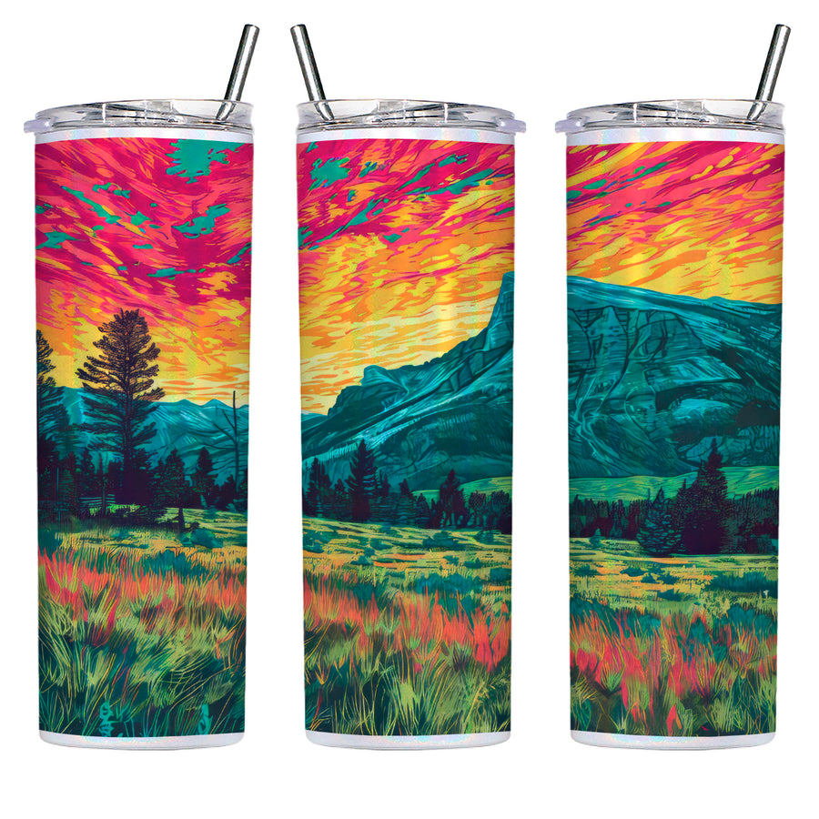 This 20oz shimmer tumbler with a metal straw is shown from three angles printed with a vibrant piece of art. The art is a stunning sunset over a mountain and a field dotted with  wildflowers.