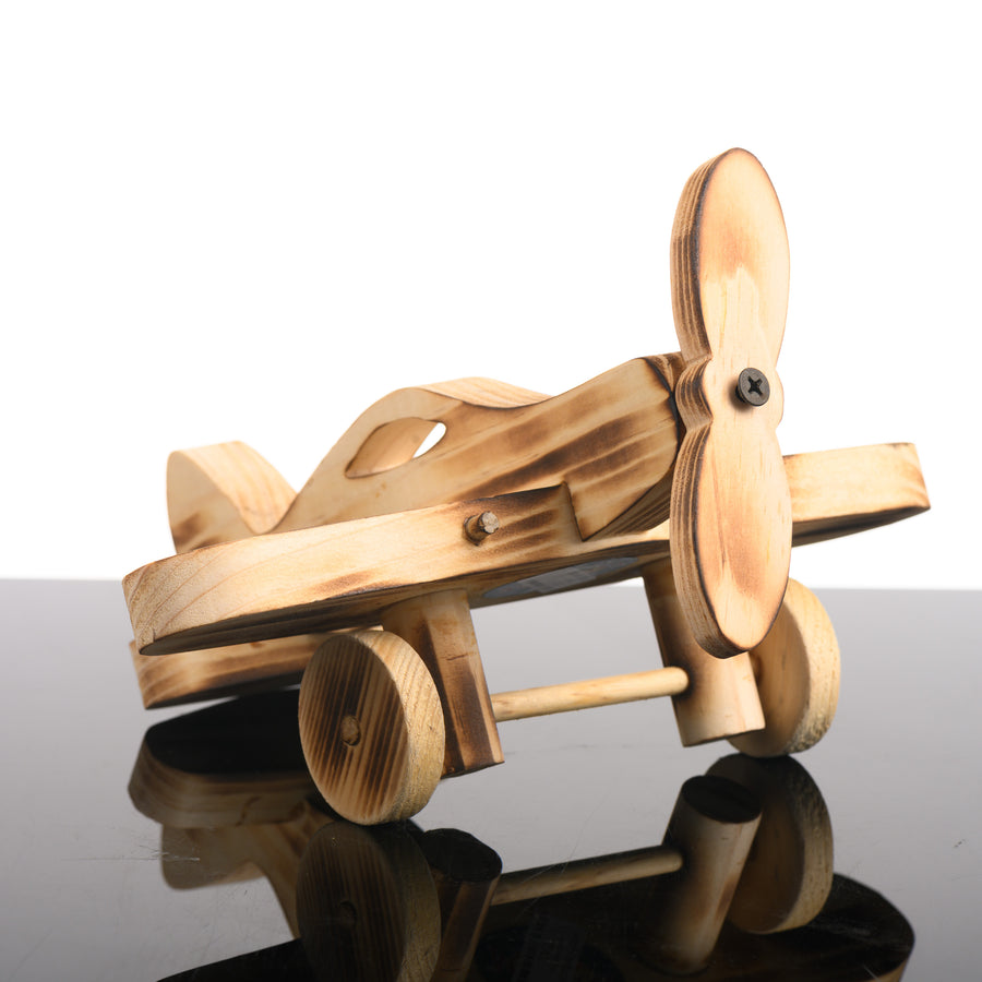 Handmade wooden kid's toy by Dotti and Jim's Kreations - this wooden airplane (made in the Bitterroot Valley Montana), makes an excellent screen-free gift for children