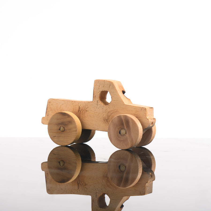 This cute wooden kid's toy is a handmade wooden truck.