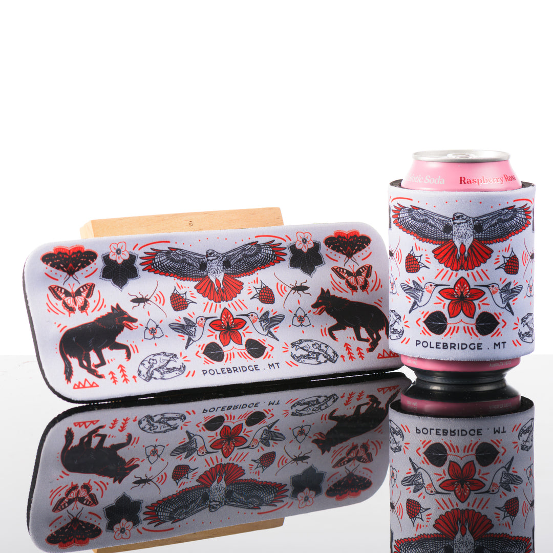 This white, red and black slap can cooler features art inspired by Polebridge, Montana.