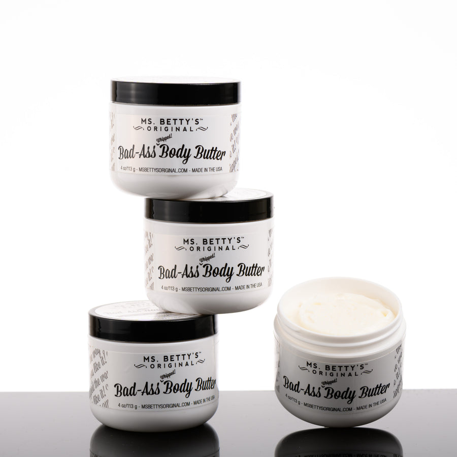 A stack of made in Montana bad-ass whipped body butter jars. Ms. Betty's Original formula.