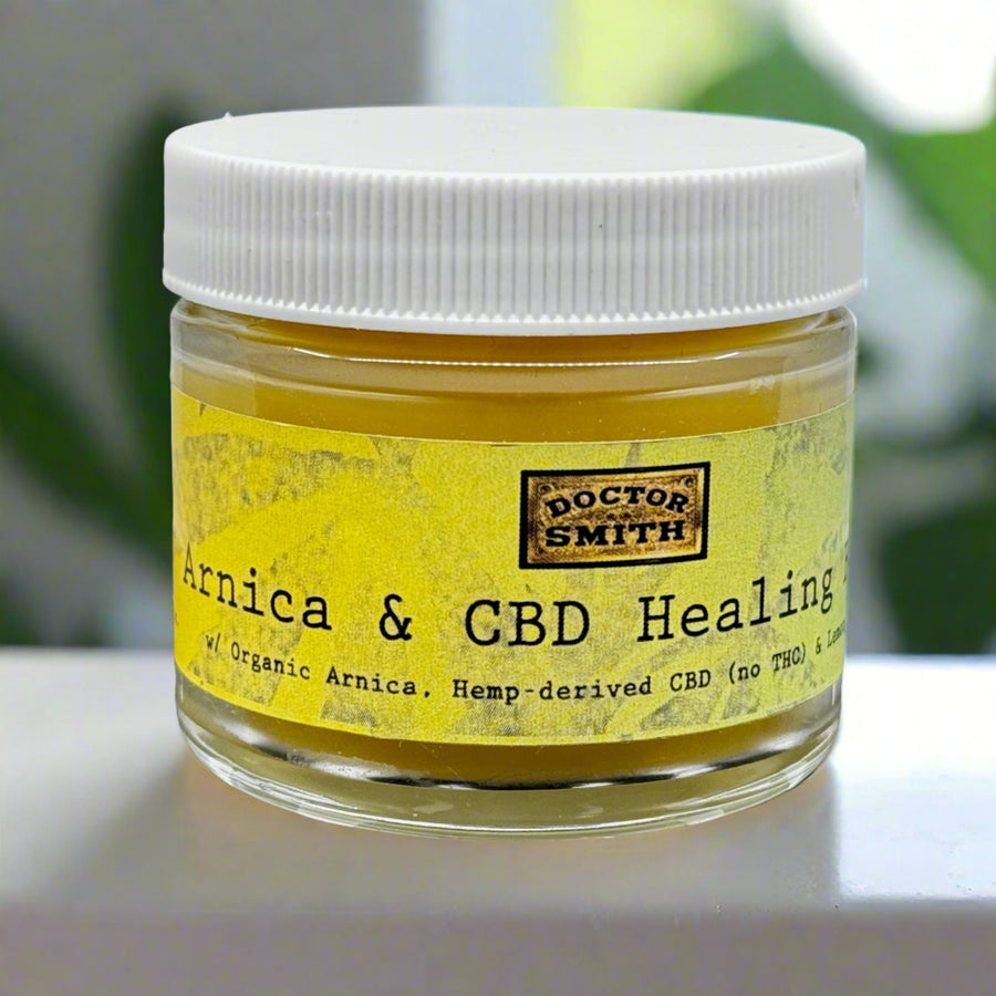 2 oz. jar of Dr Smith Botanicals' Arnica and Hemp Healing Balm, front