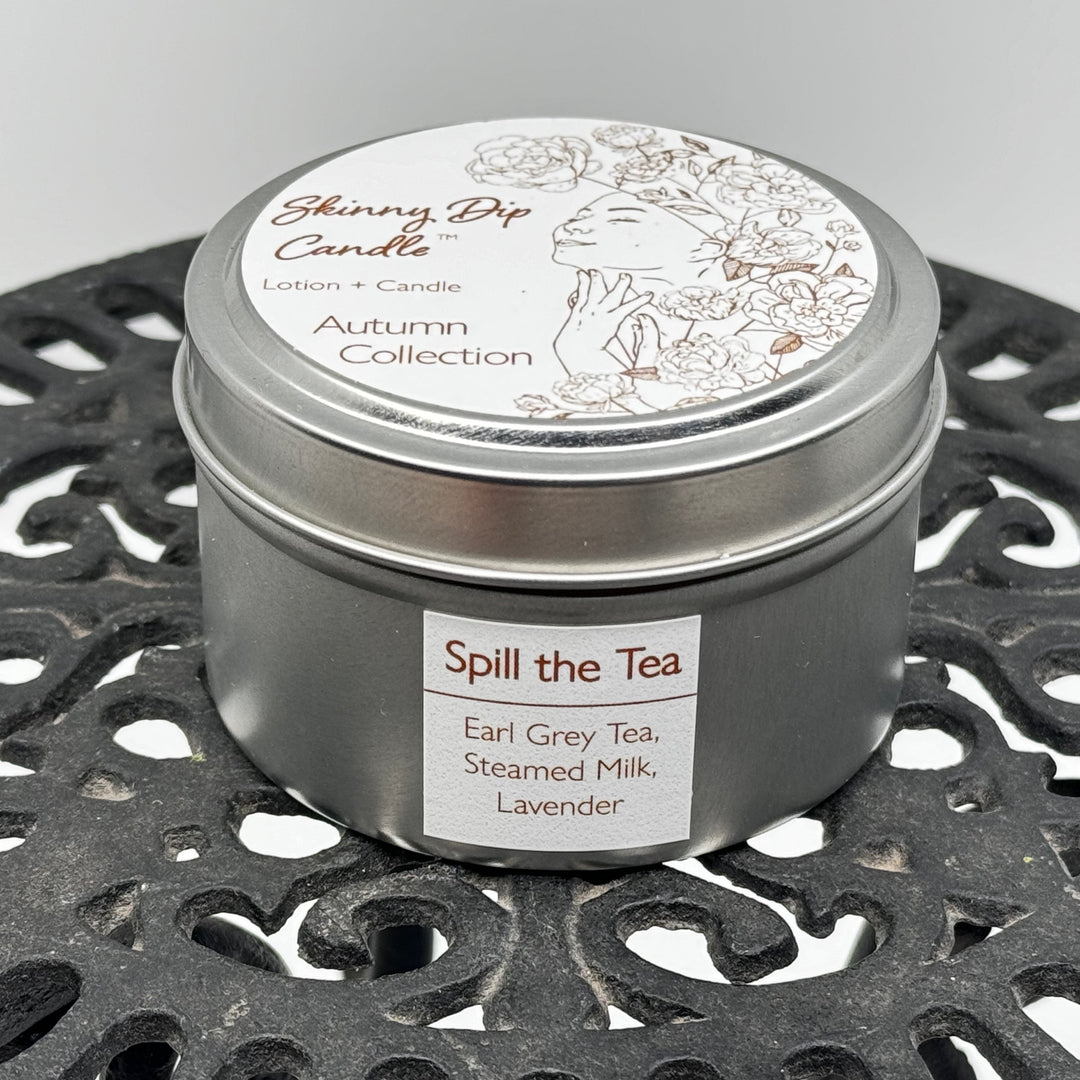 4 oz. tin of Skinny Dip Candle's Spill the Tea Lotion Candle, front