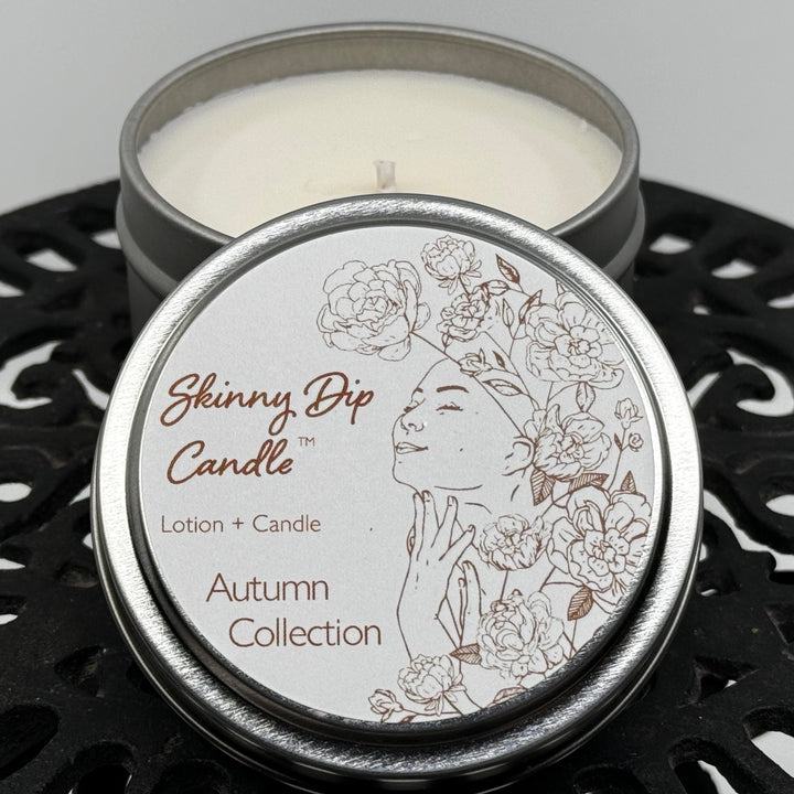 4 oz. tin of Skinny Dip Candle's Spill the Tea Lotion Candle, lid and inside