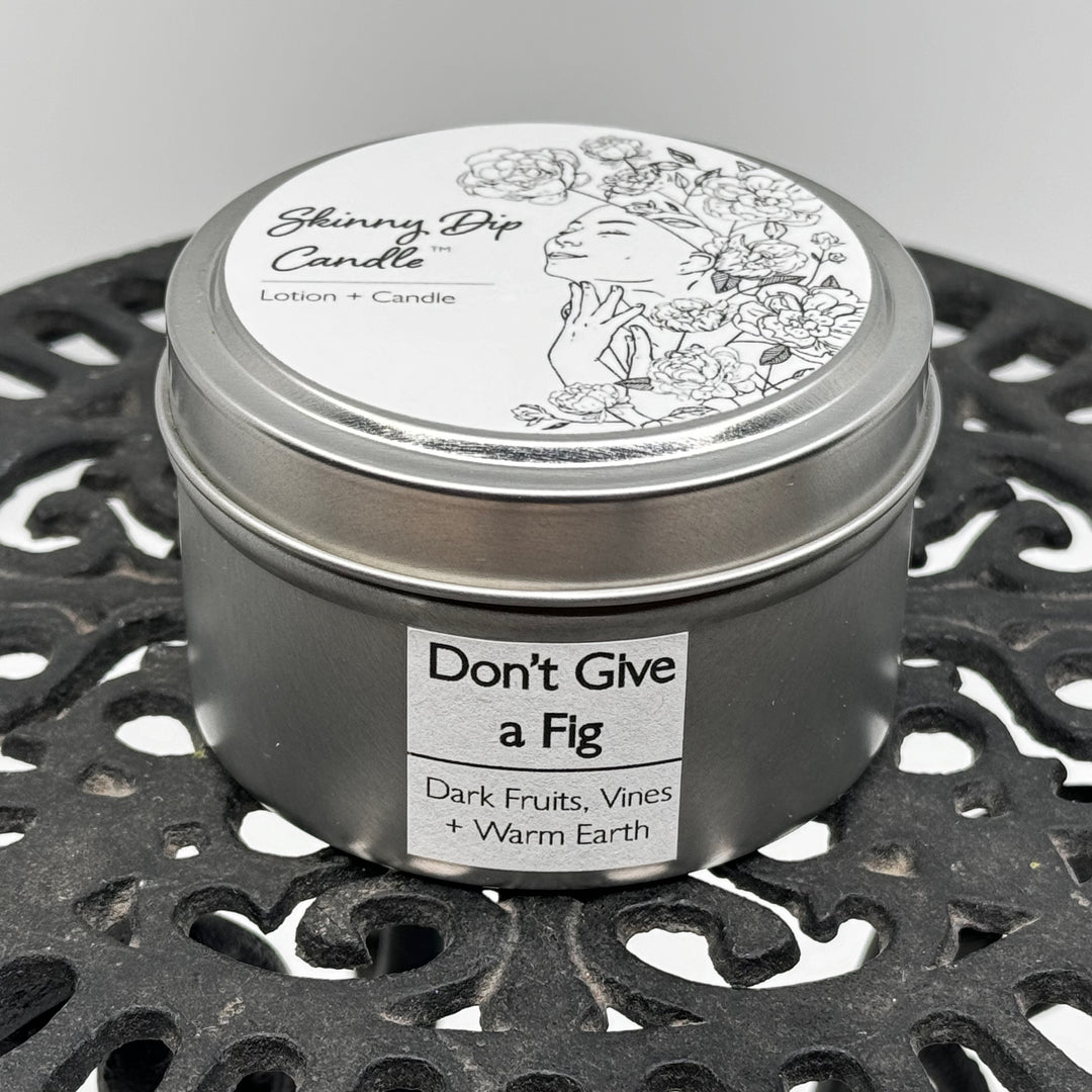 4 oz. tin of Skinny Dip Candle's Don't Give a Fig Lotion Candle, front