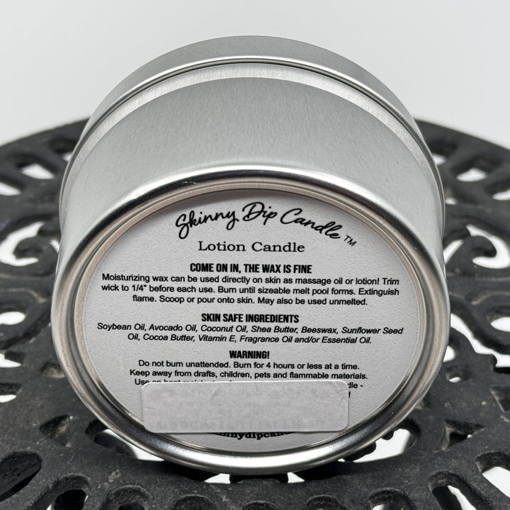 4 oz. tin of Skinny Dip Candle's Tangled in the Sheets Lotion Candle, ingredients