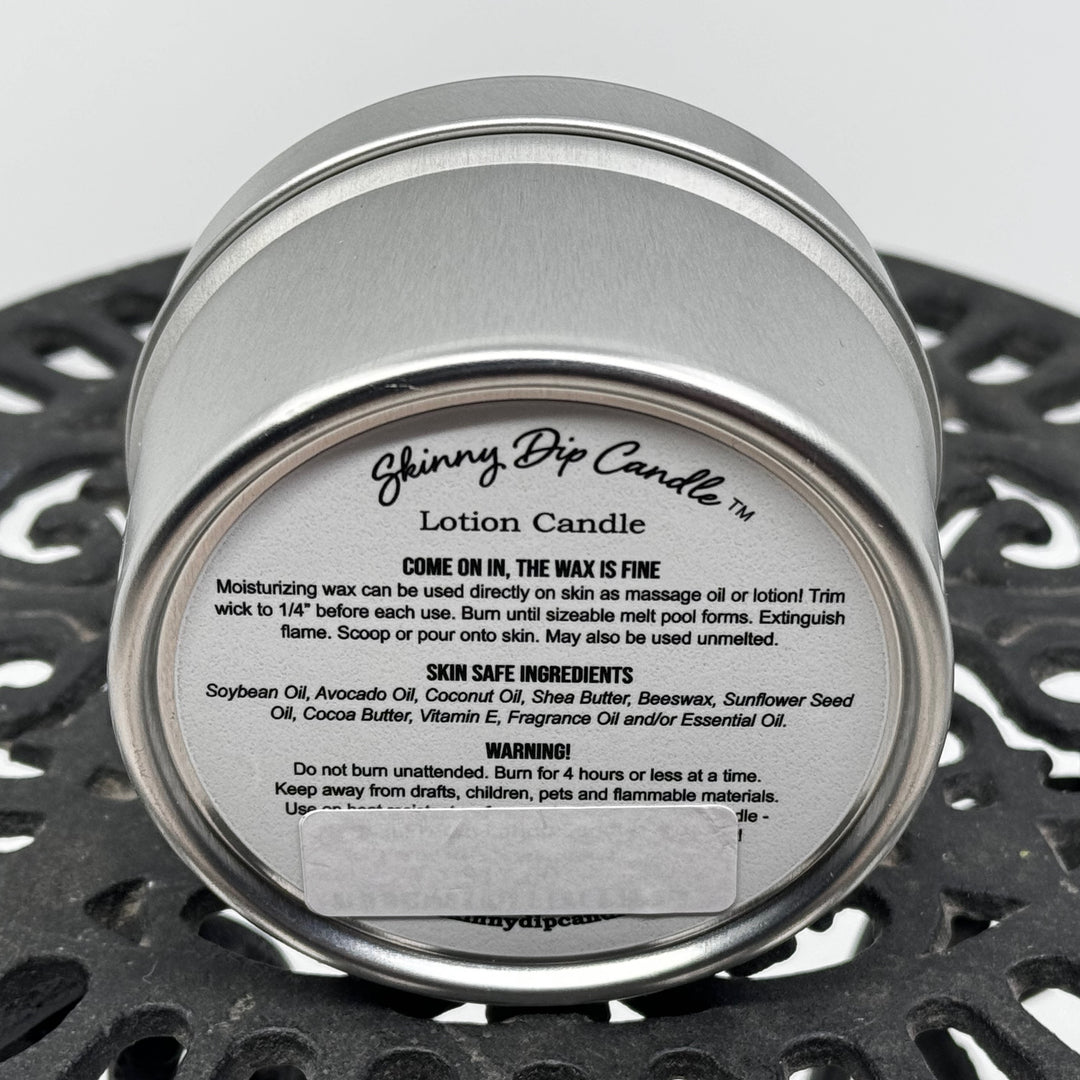 4 oz. tin of Skinny Dip Candle's Mountain Rain Lotion Candle, ingredients