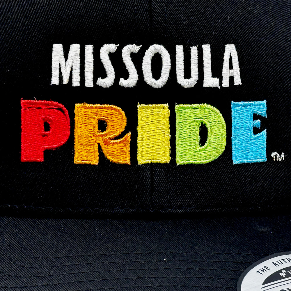 Black and White Retro Trucker Hat featuring the Missoula PRIDE logo, detail