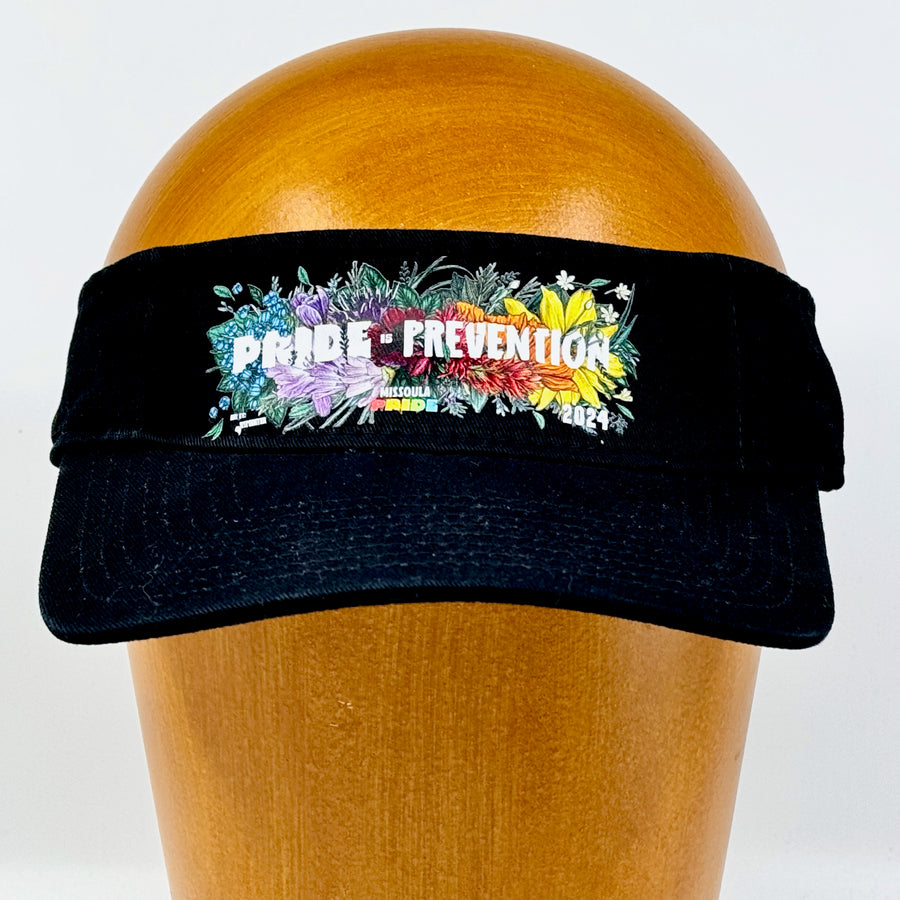 Black visor featuring the 2024 Missoula PRIDE design Pride is Prevention, front