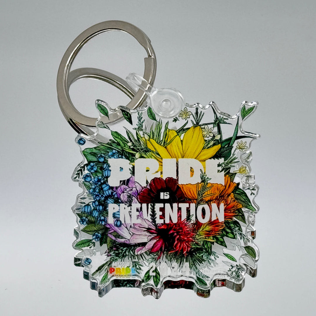 Keychain featuring the 2024 Missoula PRIDE design Pride is Prevention