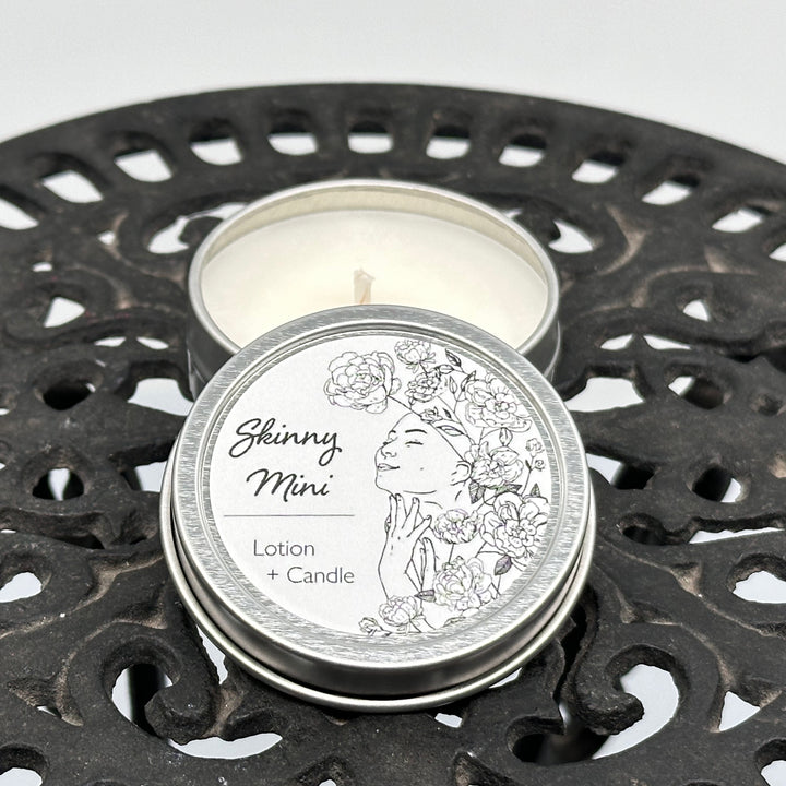 1 oz. tin of Skinny Dip Candle's Champagne Lotion + Candle, lid & inside