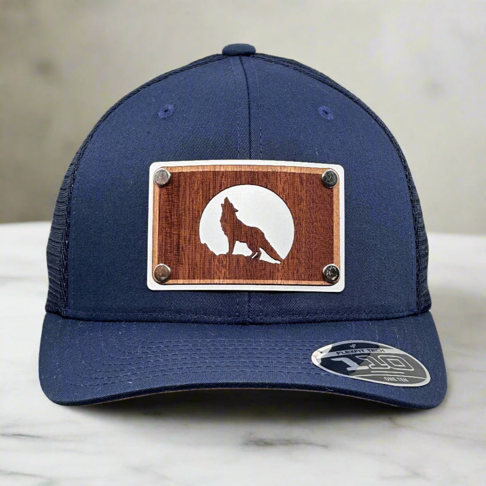 A wolf silhouete mahogany wood patch trucker hat.