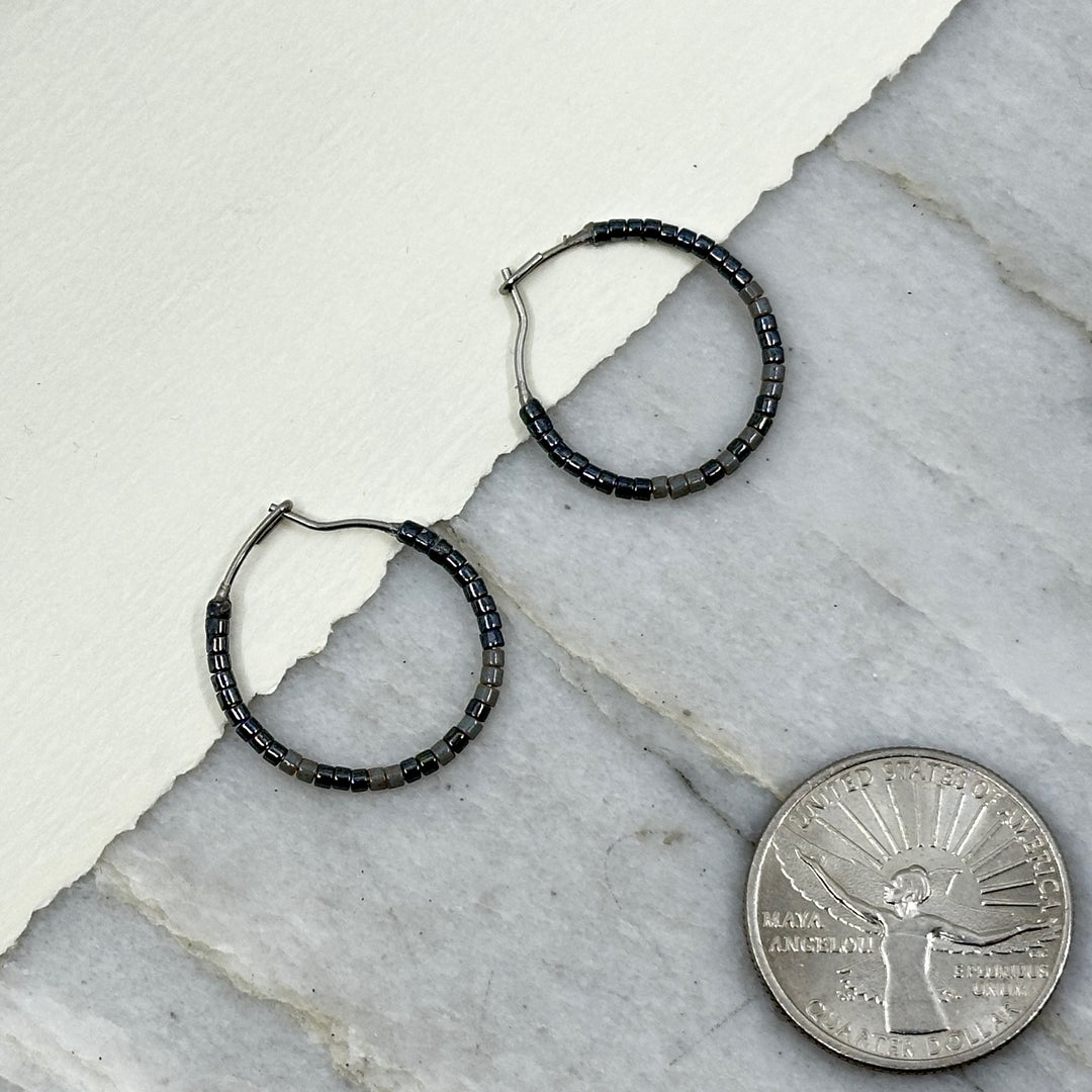 Pair of Aurum Shimmer's Beaded Stainless Steel Hoop Earrings (greys), with scale