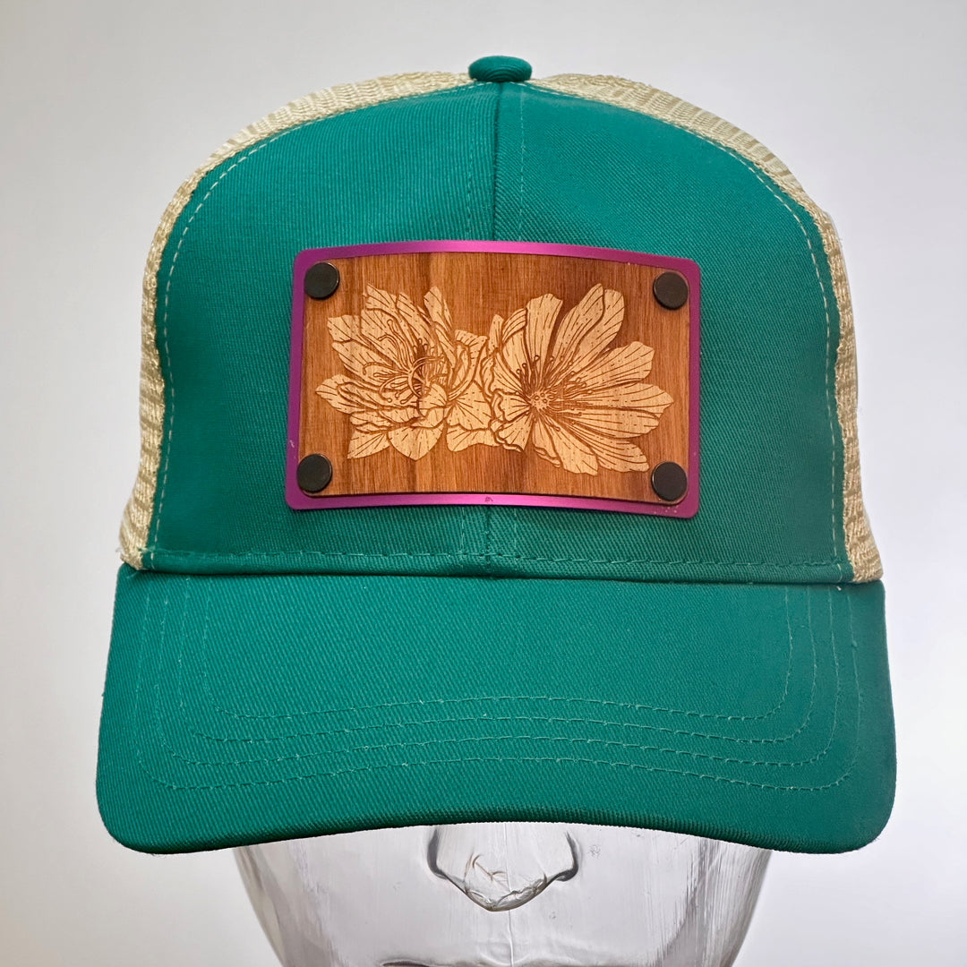 Bitterroot Cherry Wood Purple Metal Patch on Evergreen Eco Trucker Hat