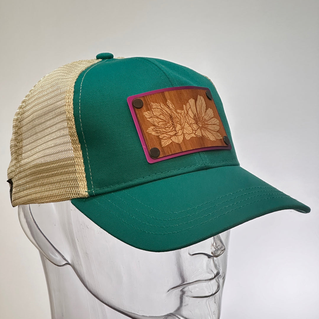 Bitterroot Cherry Wood Purple Metal Patch on Evergreen Eco Trucker Hat