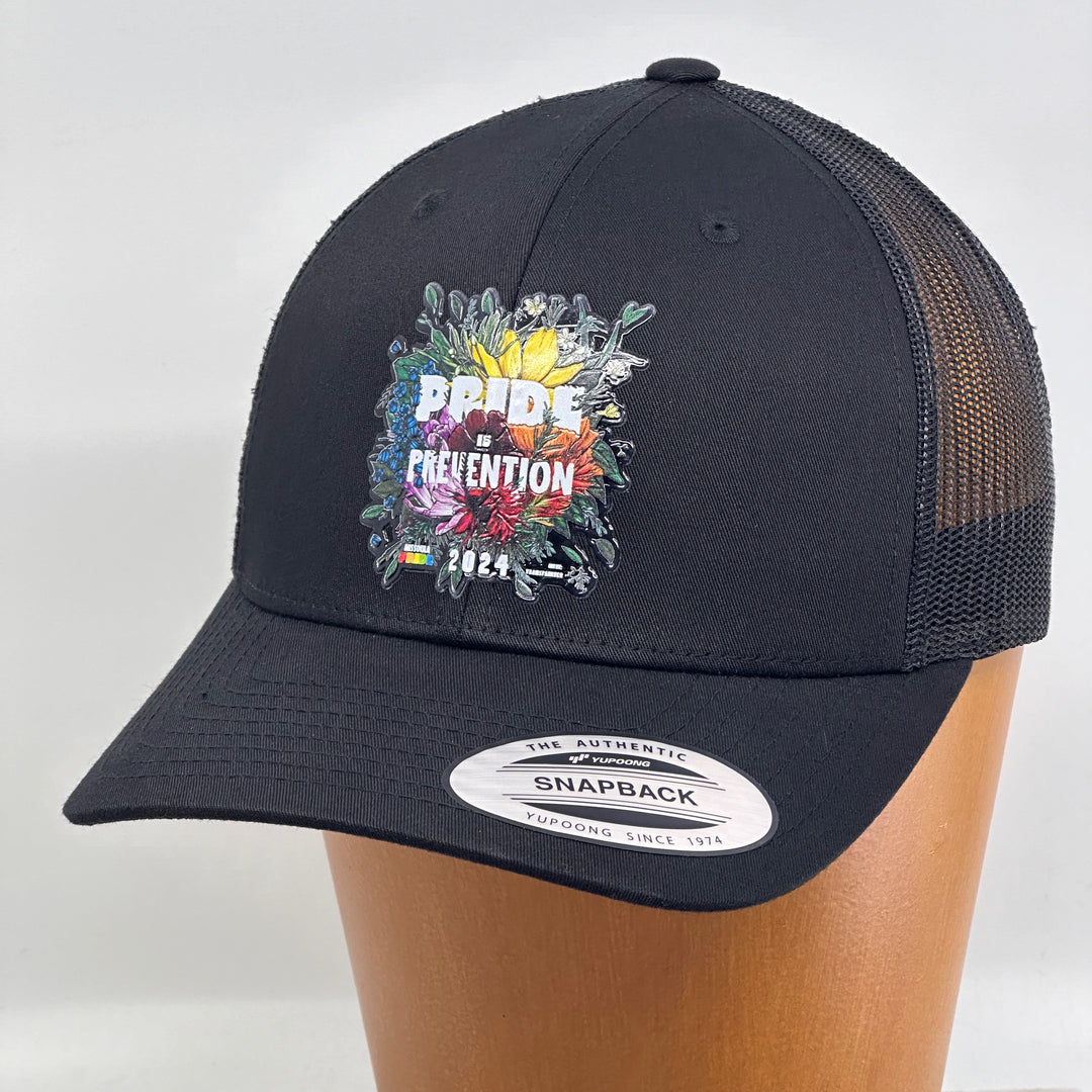 2024 Missoula PRIDE Retro Trucker Hat, 3/4 view (left)