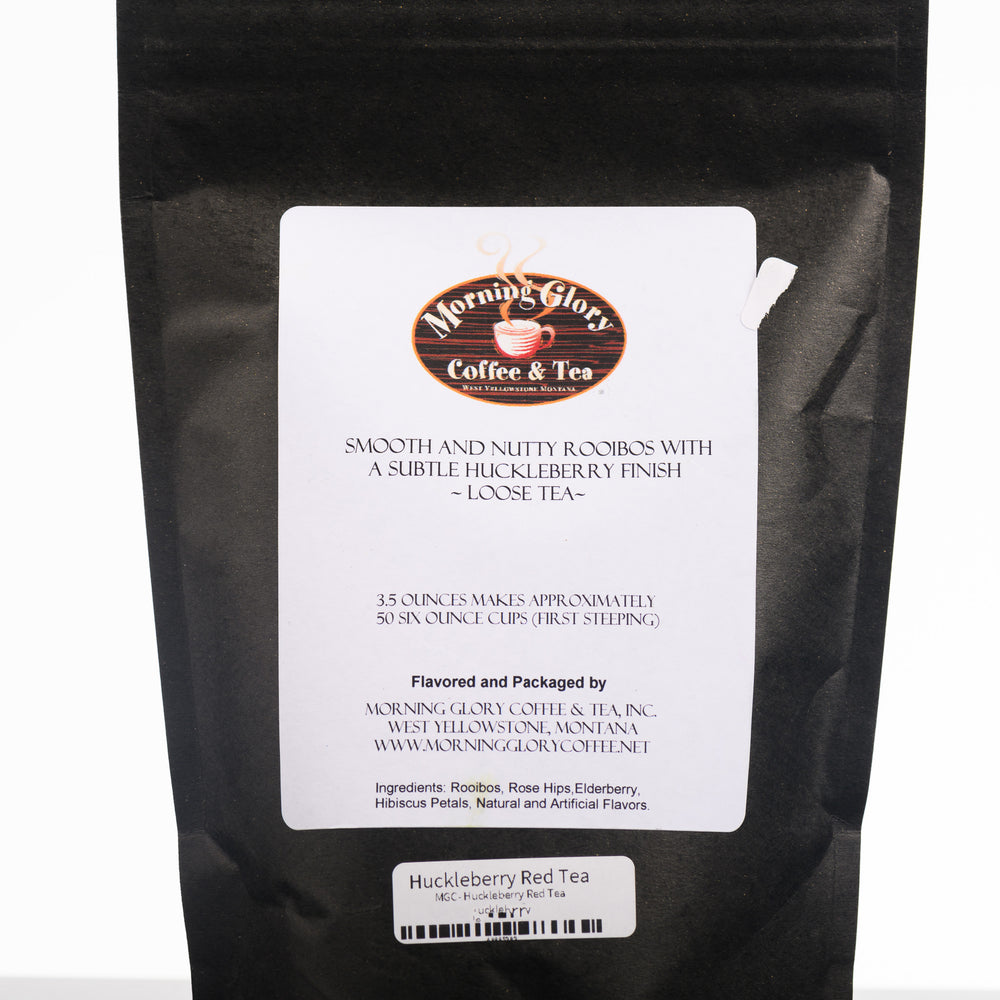 A 3.5oz bag of Huckleberry Red Tea made in Montana by Morning Glory Coffee and Tea. Ingredients Listed are Rooibos, Rose Hips, Elderberry, Hibiscus Petals, Natural and Artificial Flavors.