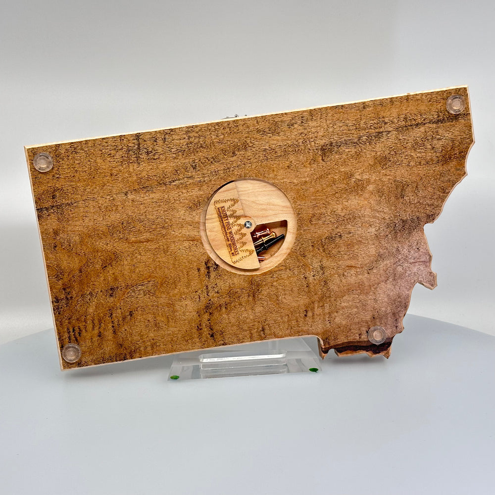 This made in Montana cribbage board features an engraved bison in a natural wood shape of Montana. The back has a hidden slot where the pegs live.