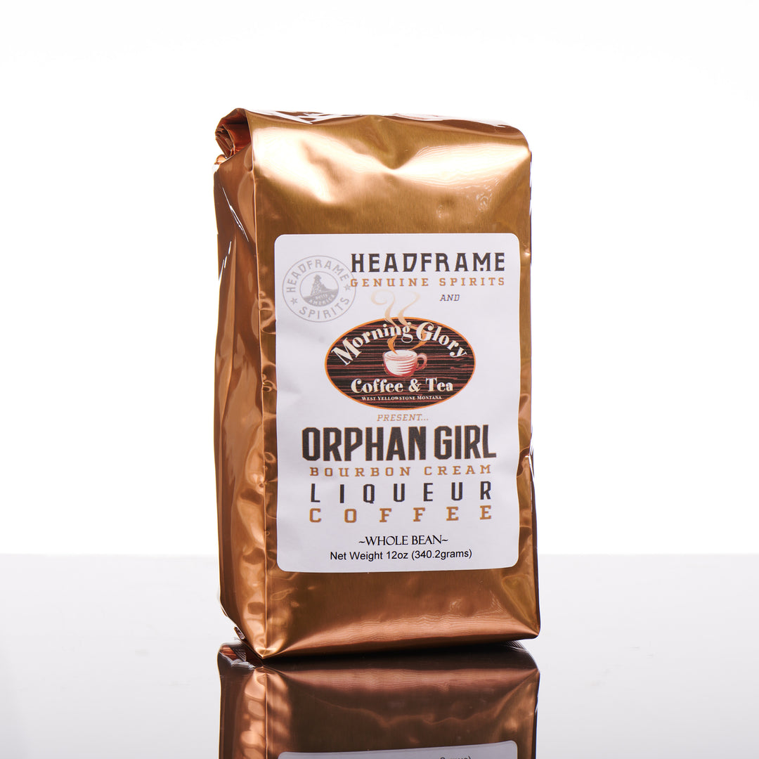 A copper bag of Morning Glory Coffee & Tea's Orphan Girl Bourbon Cream Liqueur Whole Bean Coffee.