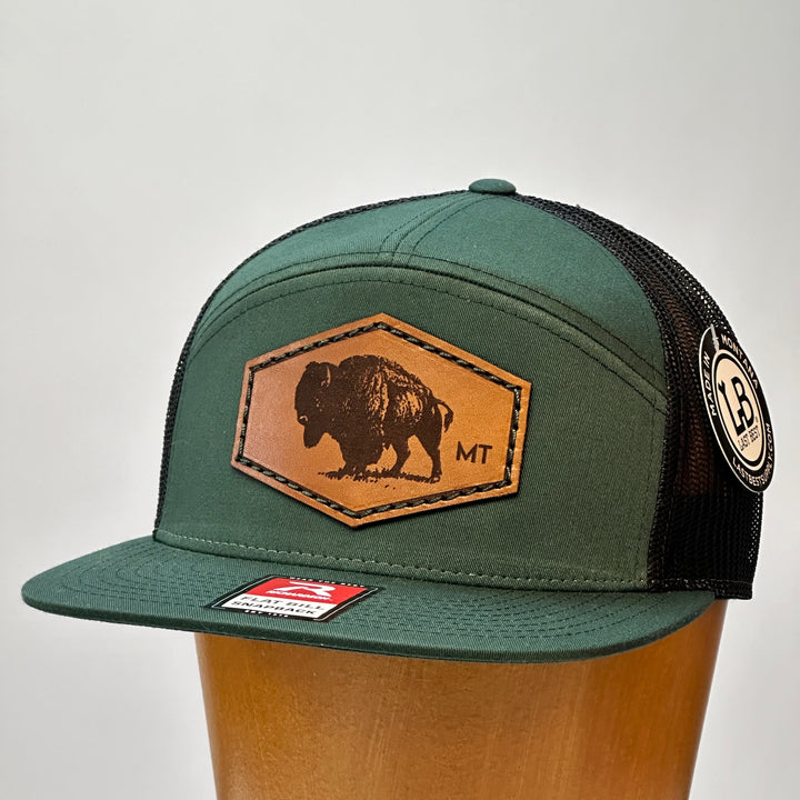 made in montana leather patch flatbill trucker hat. hand stitch