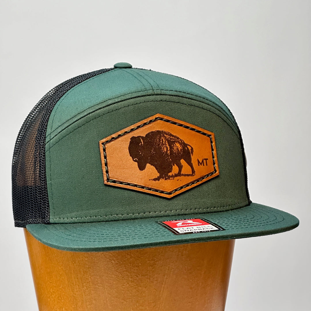 made in montana leather patch flatbill trucker hat. hand stitch