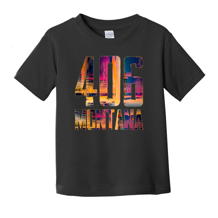 A picture of a black toddler tshirt laying flat with the colorful 406 Montana print