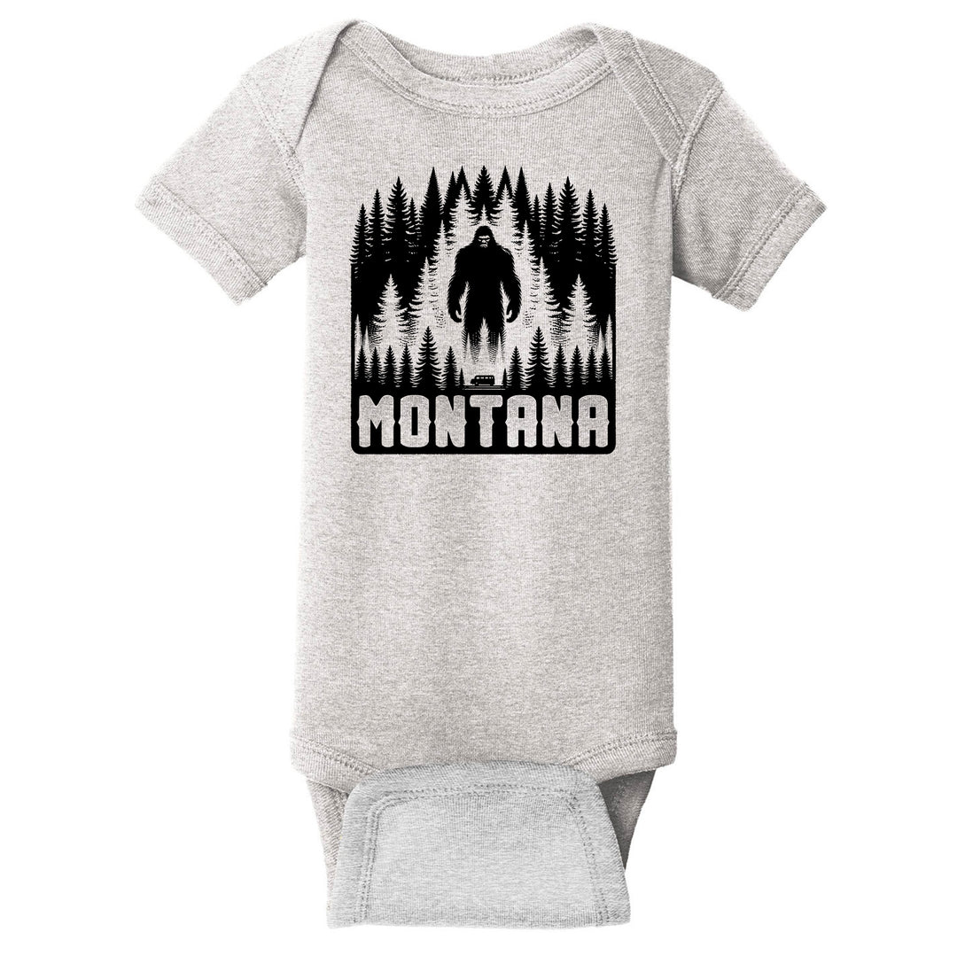 A heather grey inant onesie printed with a bigfoot design that says Montana