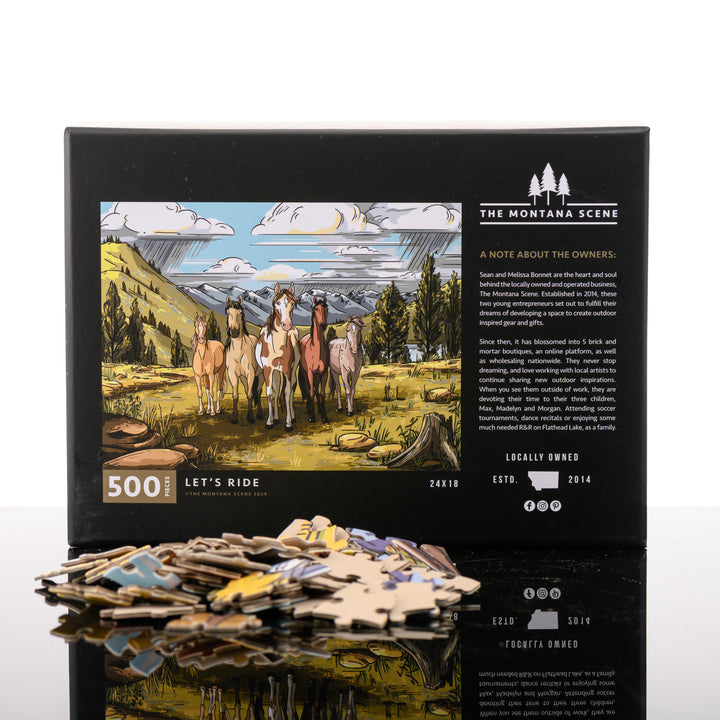 500-piece Let's Ride puzzle of horses in the foreground of a meadow and mountains, made in Montana by The Montana Scene; image depicts the box back with puzzle pieces.