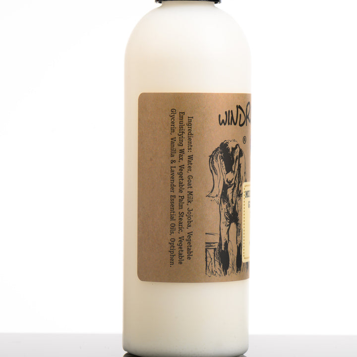 An 8 ounce bottle of Windrift Hill's Montana made moisturizing goat milk lotion in scent relaxing. The Ingredients listed are water, goat milk, jojoba, vegetable emulsifying, wax, vegetable palm stearic, vegetable glycerin, vanilla and lavender essential oils, optiphen