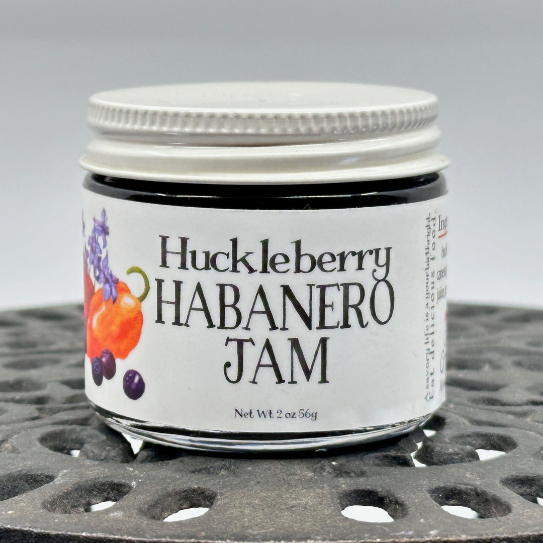 2 oz. jar of Key to the Mountain's Montana made Huckleberry Habanero Jam, front