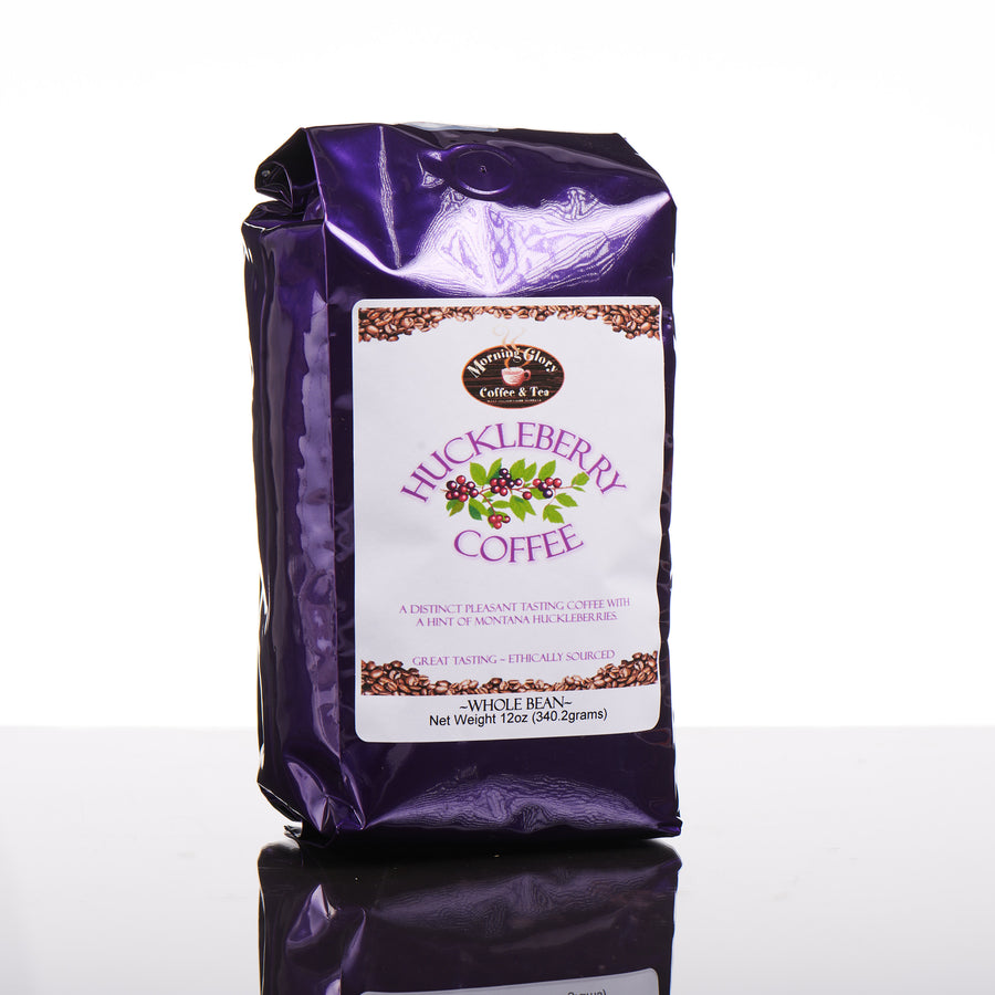 The back of a purple bag of Morning Glory Coffee and Tea's Montana made Huckleberry whole bean coffee.