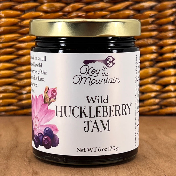 A 6oz jar of Key to the Mountain's, Montana handmade Wild Huckleberry Jam.